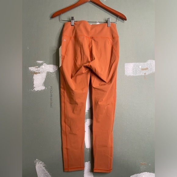NWT Fabletics High Waisted Side Pocket 7/8 Leggings in Rust Orange - Picture 5 of 6